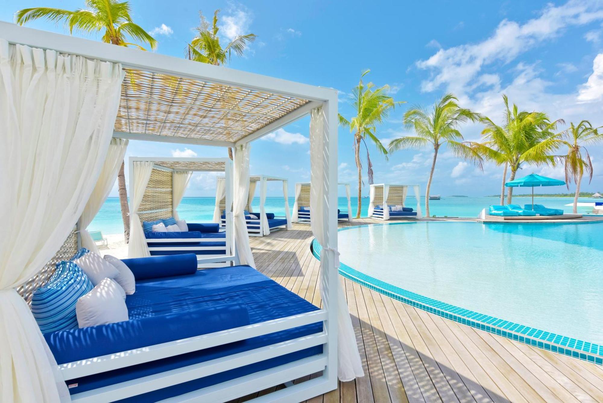 Kandima Maldives Kudahuvadhoo Bagian luar foto The swimming pool at the resort